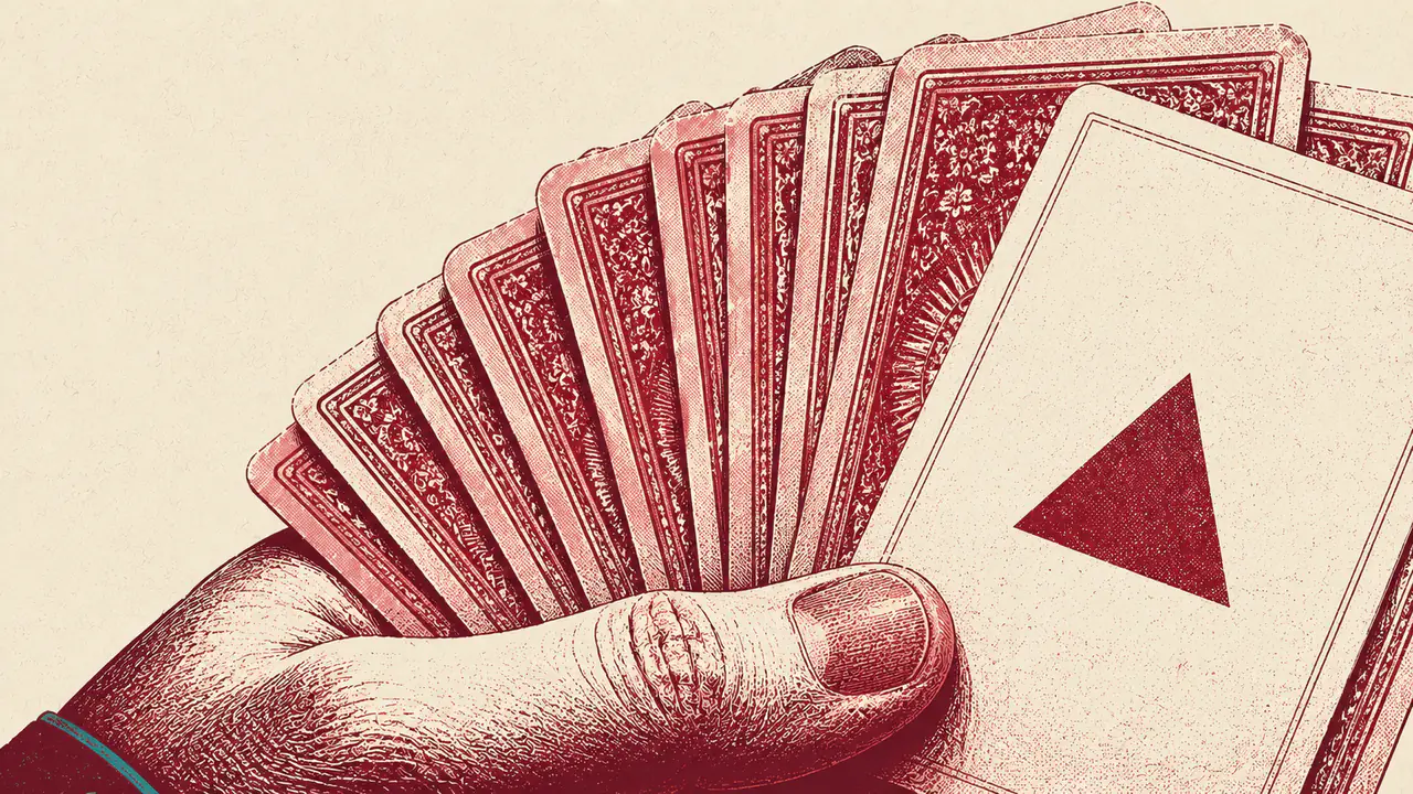 A hand holding a fan of face-down cards with one turned outward, representing the context hints an advertiser chooses to reveal