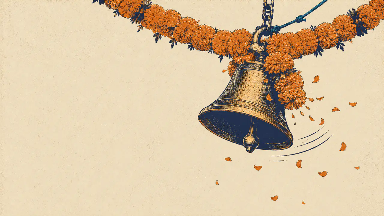 A brass temple bell hung with a marigold garland and falling petals, representing the Indian market’s place in the ChatGPT ads rollout